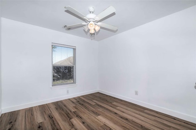 spare room featuring hardwood / wood-style flooring