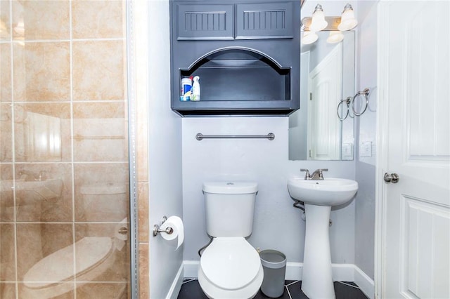 bathroom with toilet and sink