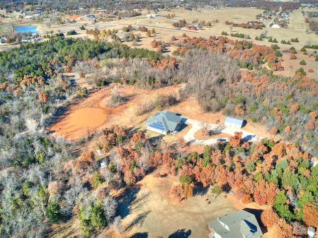 aerial view with a water view and a rural view