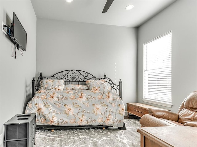 bedroom with a ceiling fan and recessed lighting