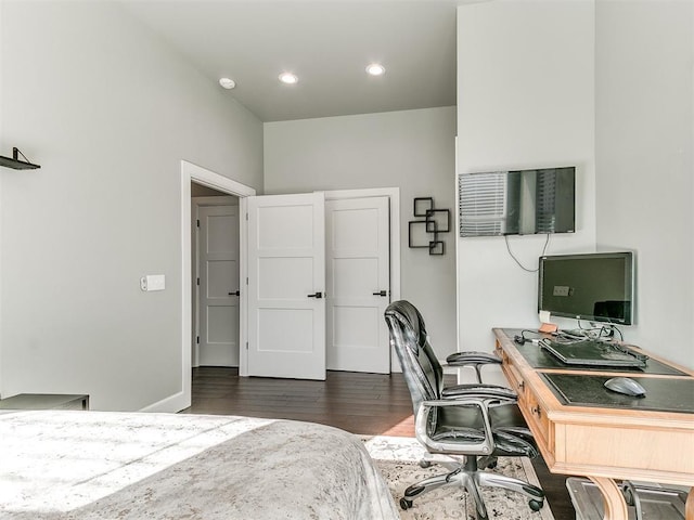 bedroom featuring recessed lighting, dark wood-style flooring, and baseboards