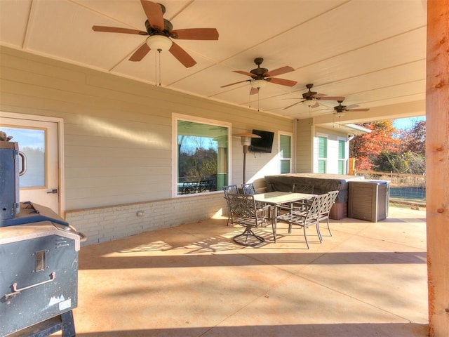 view of patio / terrace featuring outdoor dining area and ceiling fan