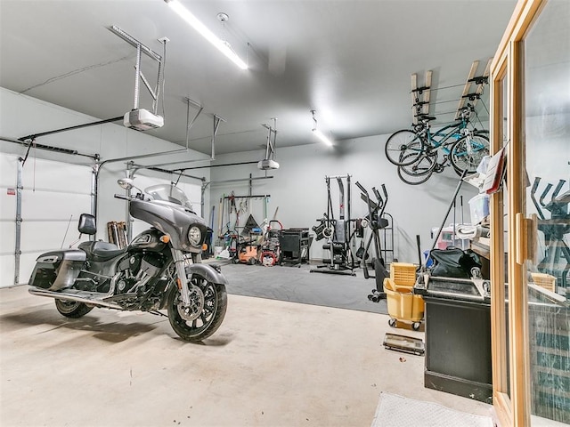 garage featuring a garage door opener