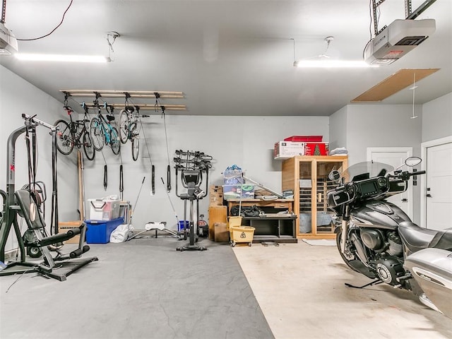 garage featuring a garage door opener