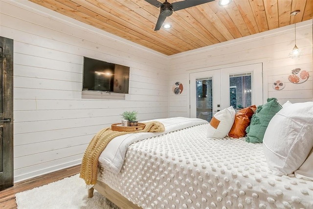 bedroom with access to outside, ceiling fan, french doors, and wooden ceiling