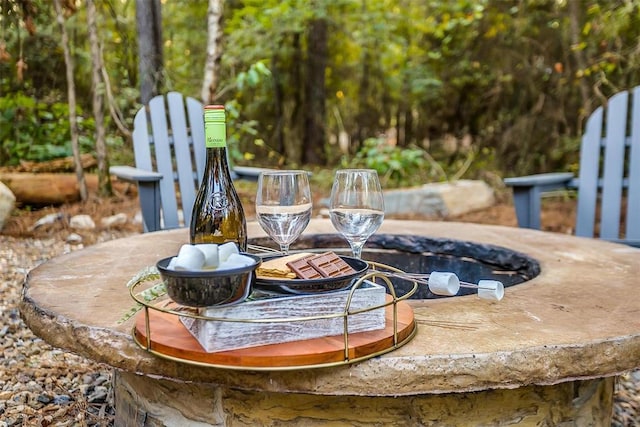 details featuring an outdoor fire pit