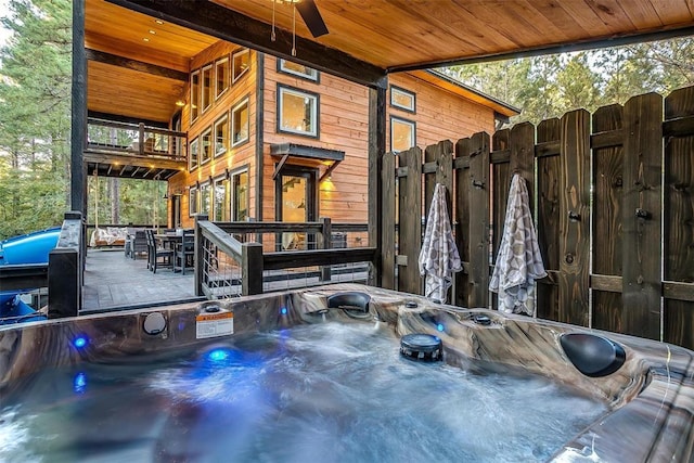 exterior space featuring a hot tub