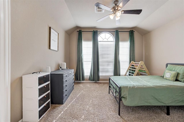 carpeted bedroom featuring ceiling fan and lofted ceiling