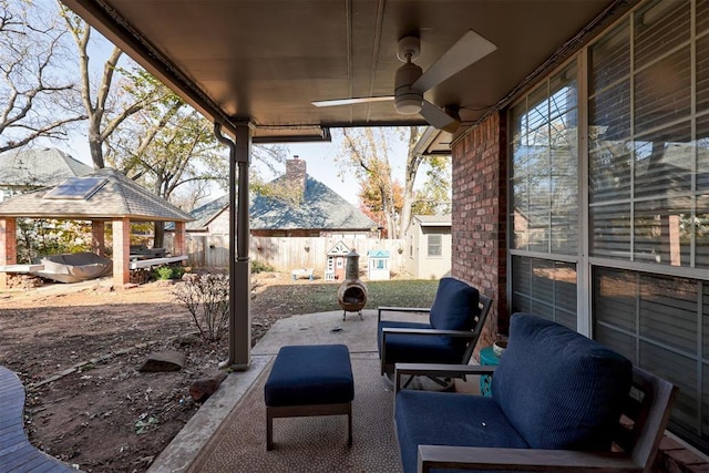 view of patio with a gazebo and ceiling fan