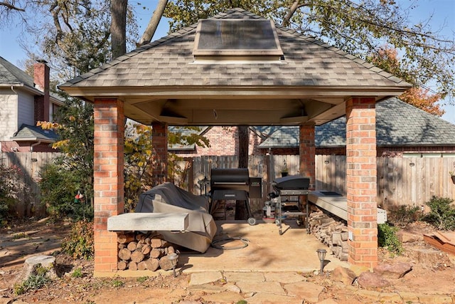 view of patio / terrace with a gazebo and grilling area