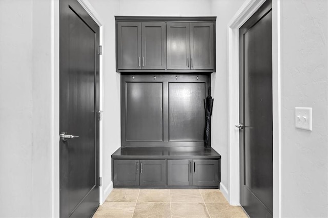 mudroom featuring light tile patterned flooring