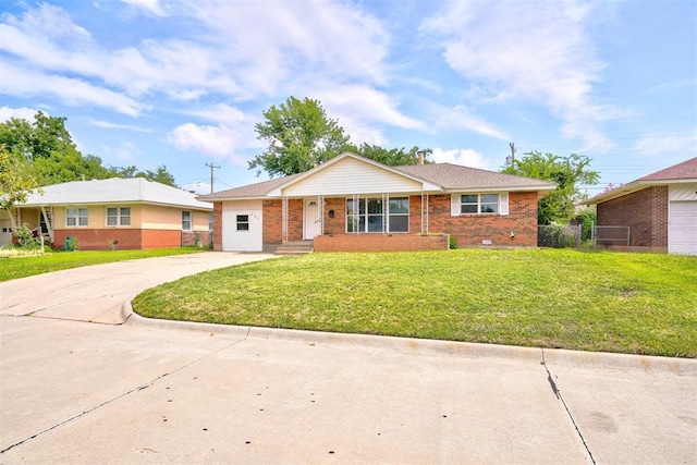 ranch-style house with a front lawn