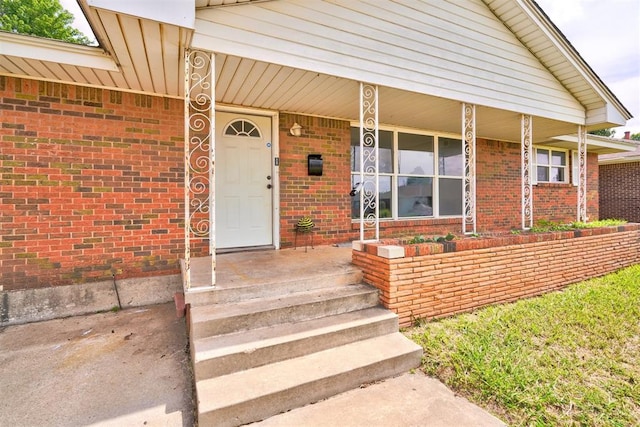 property entrance with a porch