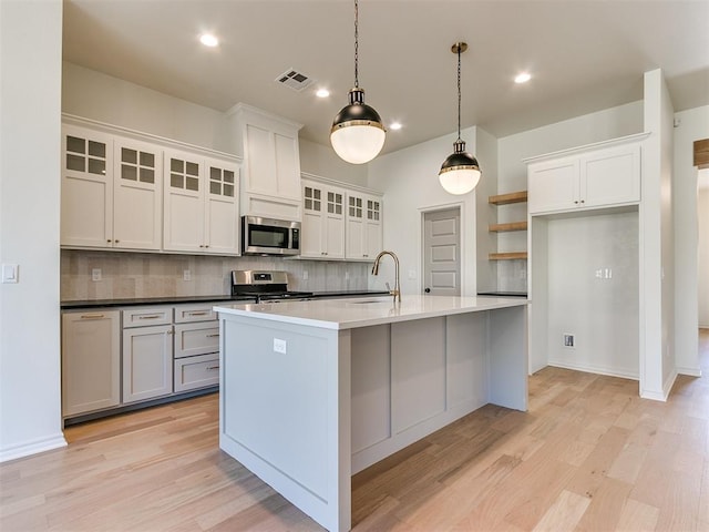 kitchen featuring white cabinets and stainless steel appliances