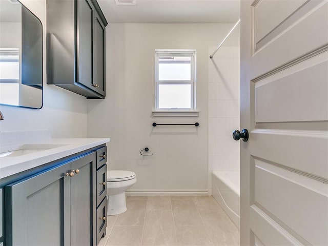 full bathroom featuring tile patterned flooring, vanity, toilet, and tub / shower combination