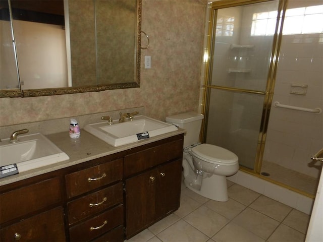 8300 Brookridge Dr, Oklahoma City, OK 73132 - bathroom with tile patterned flooring, vanity, toilet, and an enclosed shower