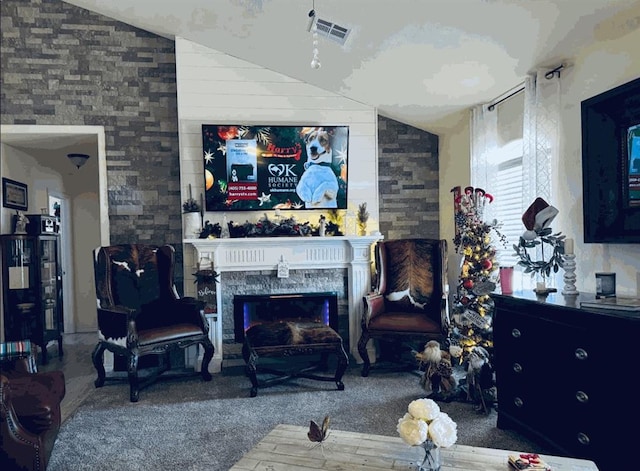 living room with carpet flooring, a premium fireplace, and lofted ceiling