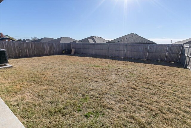 view of yard with central AC