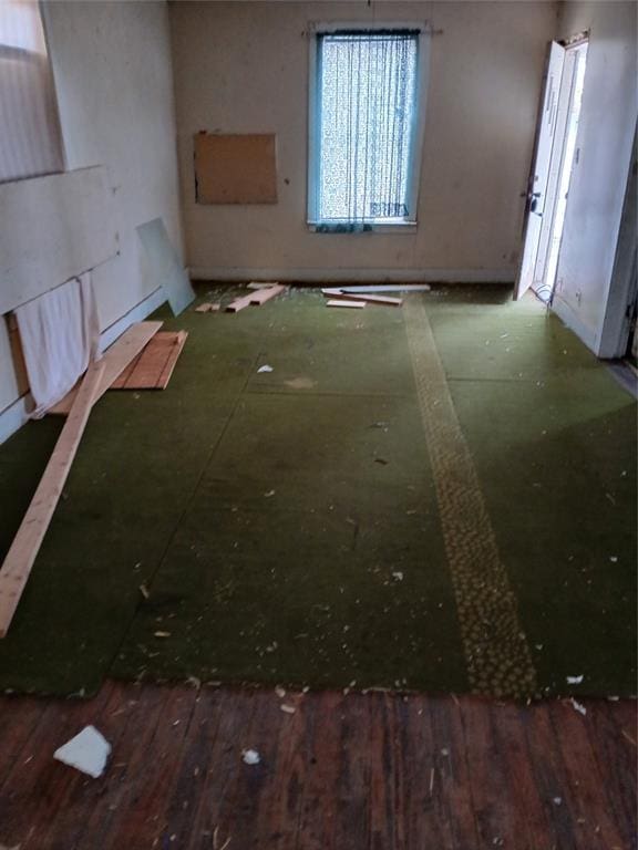 empty room featuring dark hardwood / wood-style floors