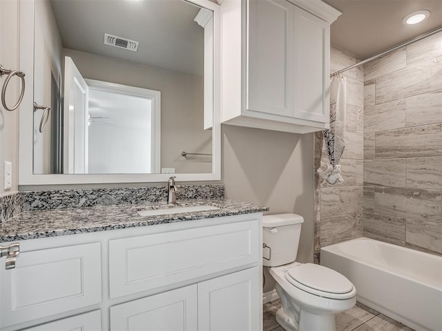 full bathroom featuring vanity, toilet, and shower / bath combo with shower curtain