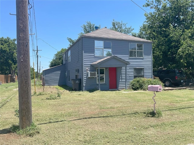 view of front property with a front lawn