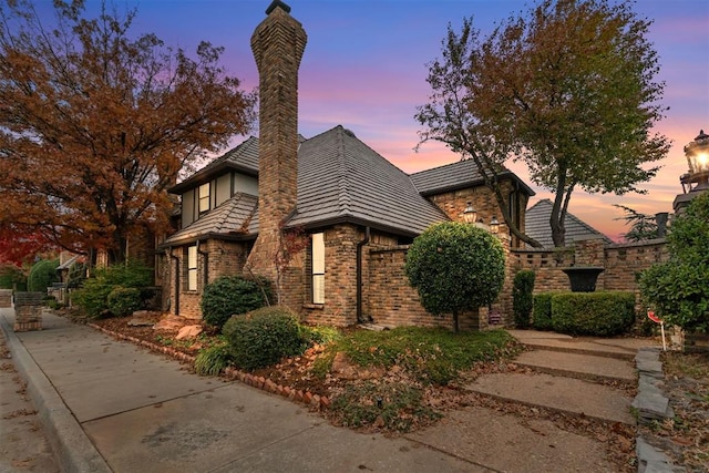 view of property exterior at dusk