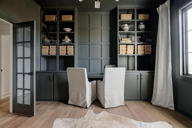 dining space with light wood-type flooring