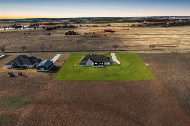 aerial view at dusk with a rural view