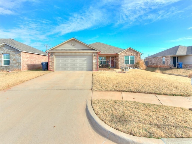 ranch-style home featuring a garage