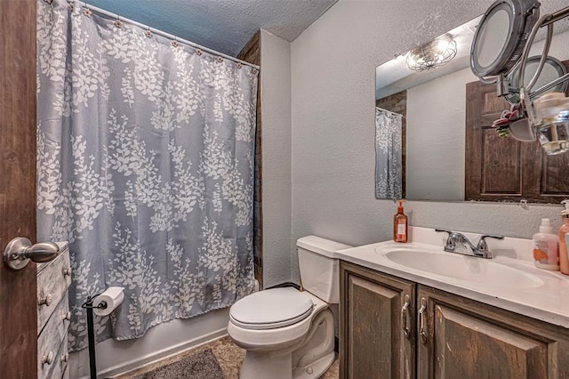 full bathroom with vanity, toilet, a textured ceiling, and shower / tub combo