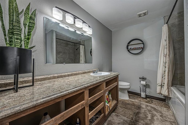 full bathroom with vanity, toilet, and shower / tub combo with curtain