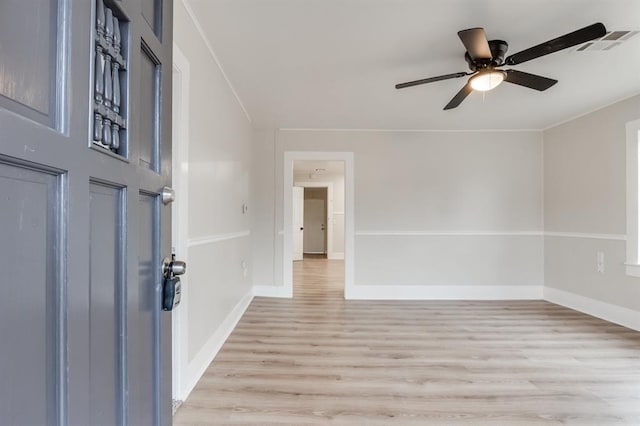 unfurnished room with ceiling fan and light hardwood / wood-style flooring