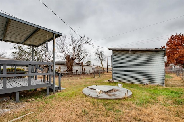 view of yard featuring a wooden deck