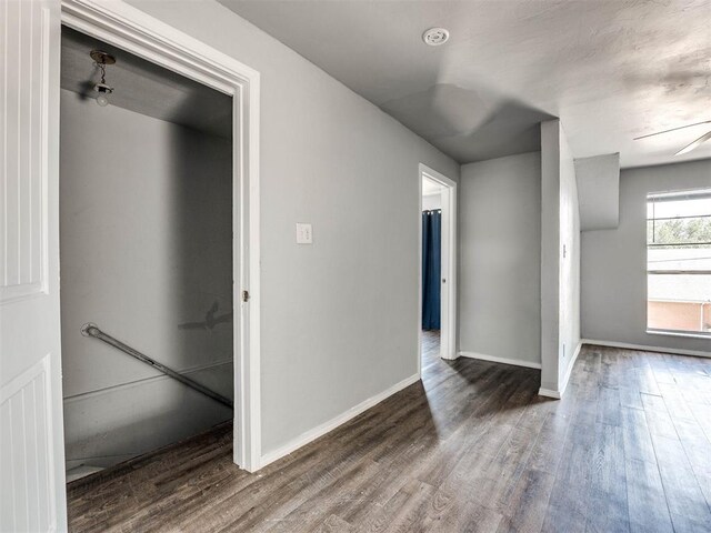 interior space with dark wood-type flooring