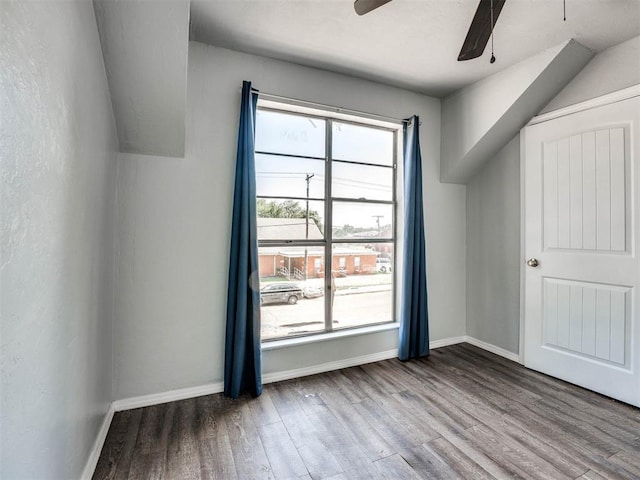 bonus room featuring ceiling fan and wood-type flooring