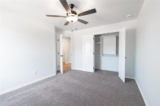 1817 Taines Turn, Norman, OK 73072 - unfurnished bedroom with carpet, baseboards, ceiling fan, and a closet