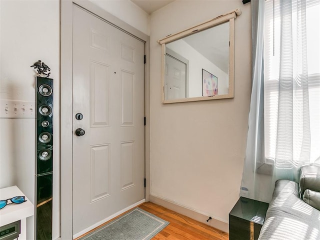 doorway to outside with light hardwood / wood-style floors