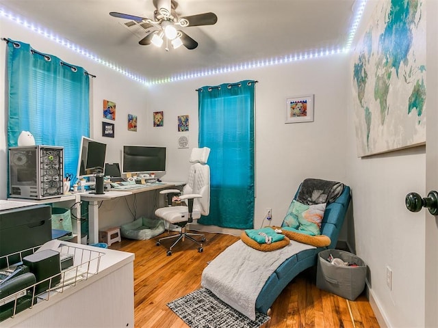 office featuring ceiling fan and hardwood / wood-style flooring