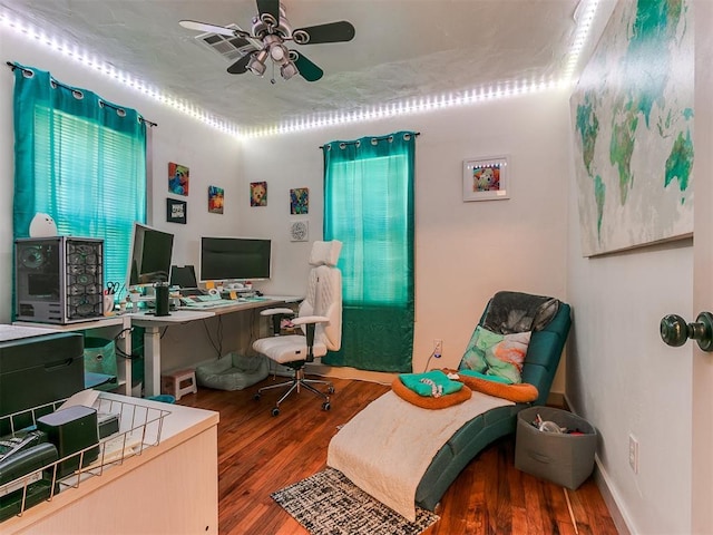 office featuring ceiling fan and wood-type flooring