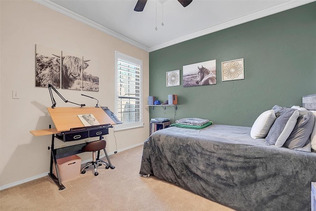 carpeted bedroom with ceiling fan and crown molding