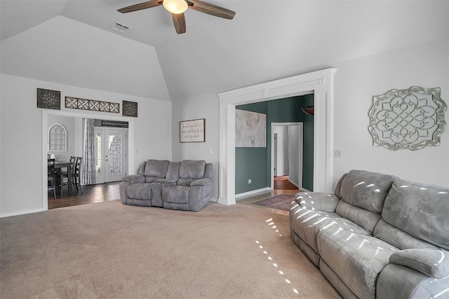 living room featuring carpet, french doors, ceiling fan, and lofted ceiling