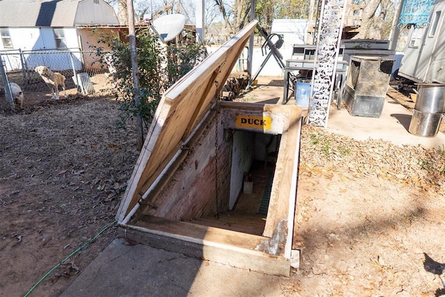 view of entry to storm shelter