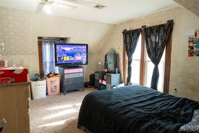 bedroom featuring ceiling fan and carpet floors