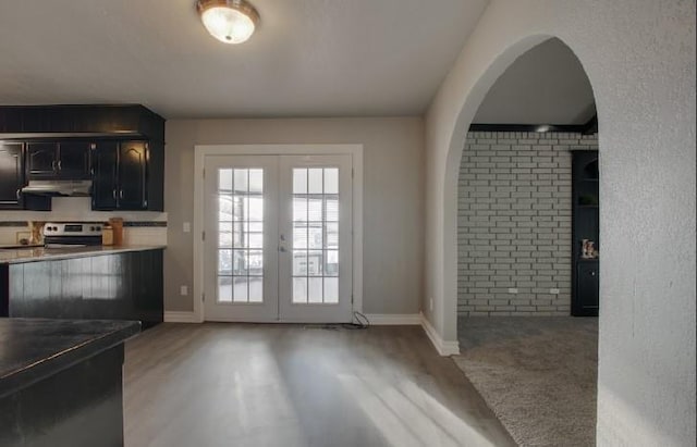 doorway featuring french doors and light hardwood / wood-style floors