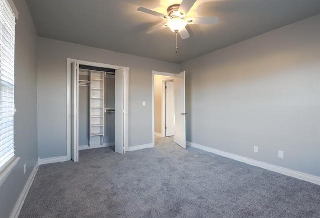 unfurnished bedroom featuring carpet flooring, a closet, and ceiling fan