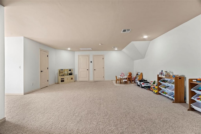 playroom featuring carpet flooring and vaulted ceiling