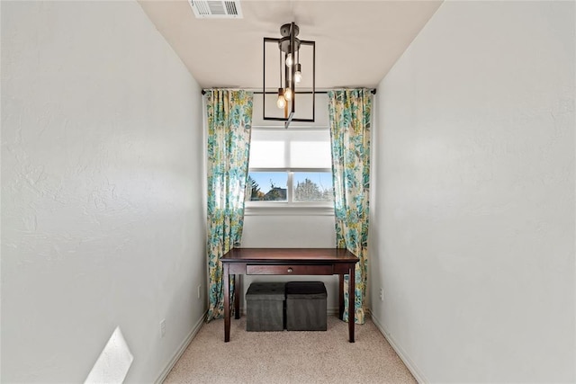 view of carpeted dining space