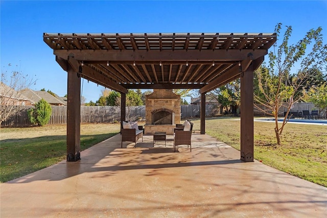 view of patio / terrace with an outdoor stone fireplace