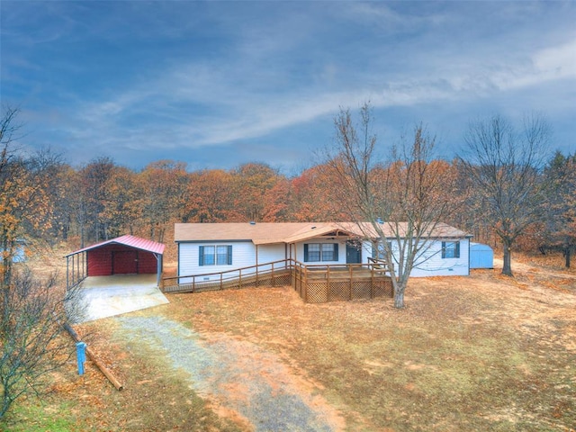 view of front of property with a carport