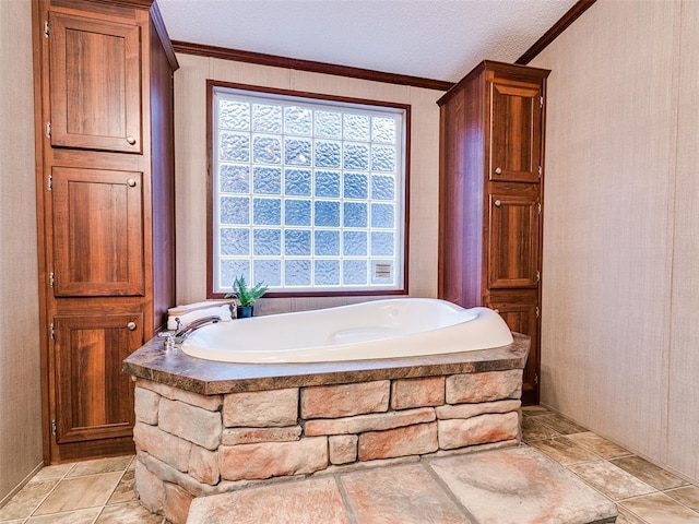 bathroom with a washtub and crown molding